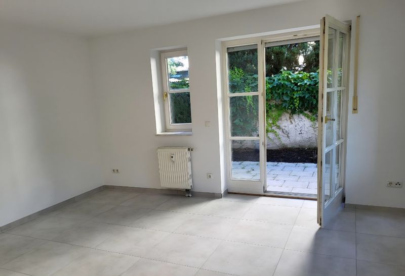 Charmante 1 Zimmer-Wohnung mit Terrasse, Garten & Tiefgaragenstellplatz 